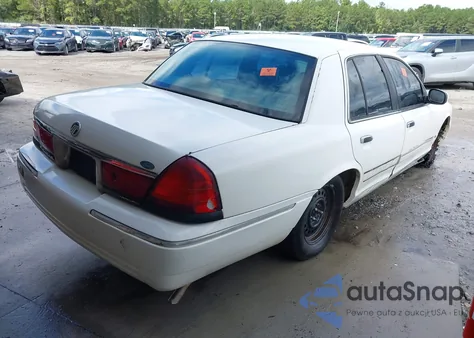 1999 Mercury Grand Marquis Gs z USA, uszkodzony, nr VIN 2MEFM74W7XX734151